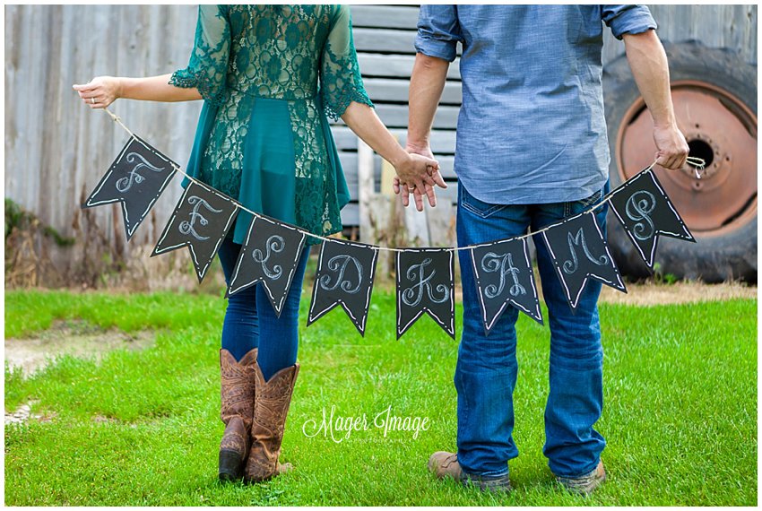 engagement photos with sign of last name
