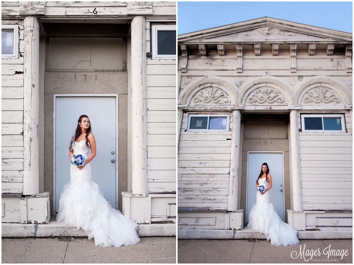 bride standing in doorway with bouquet