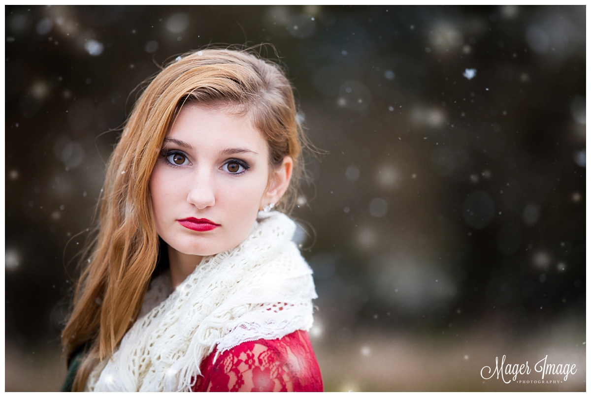 sage girl in snow with red lipstick