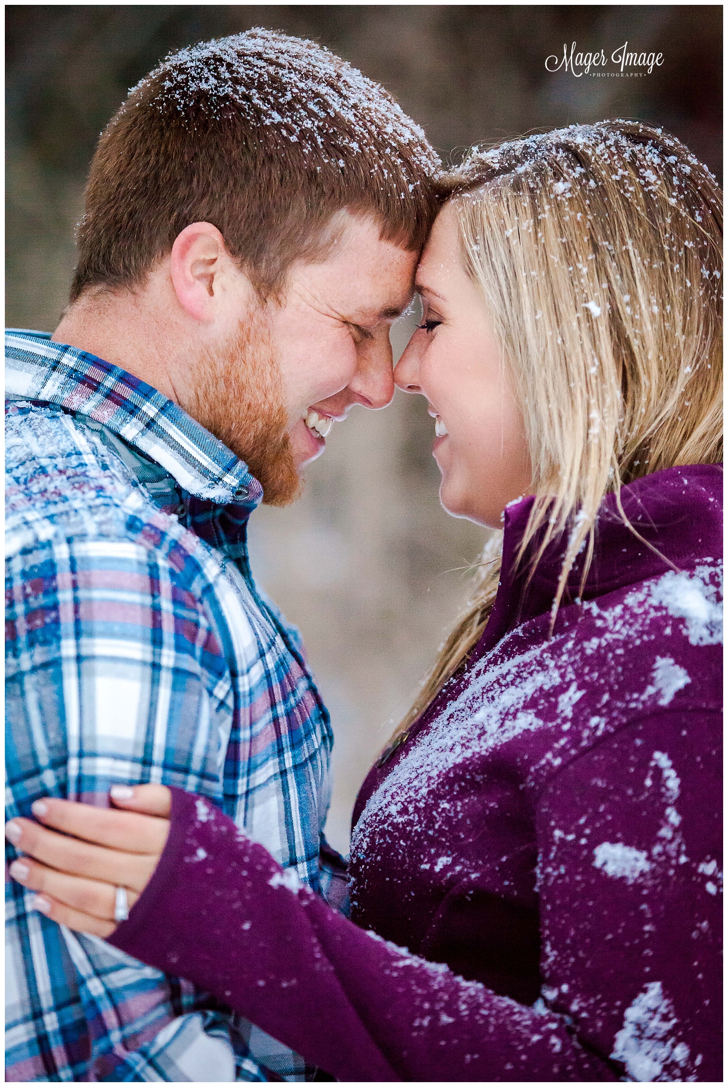 snow covered couple blue purple