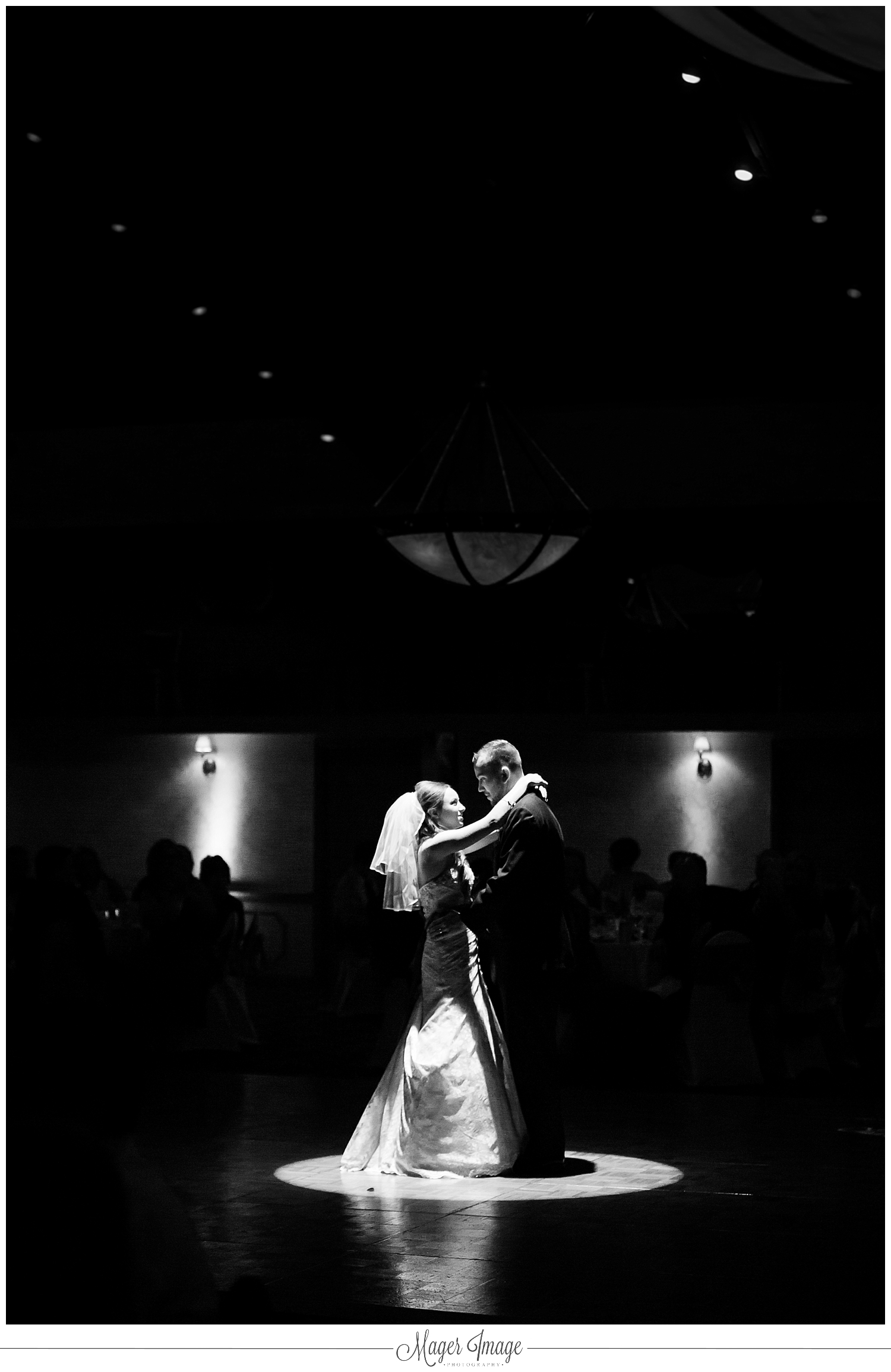 bride groom first dance spotlight black white