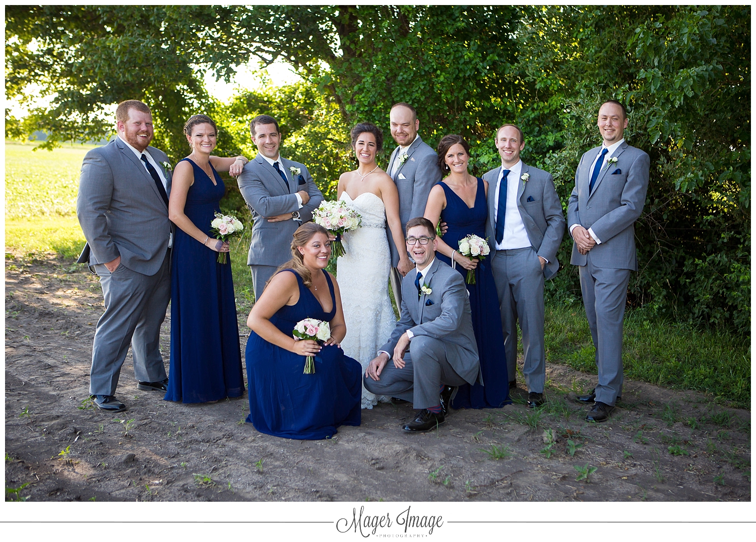 bridal party group outdoors field