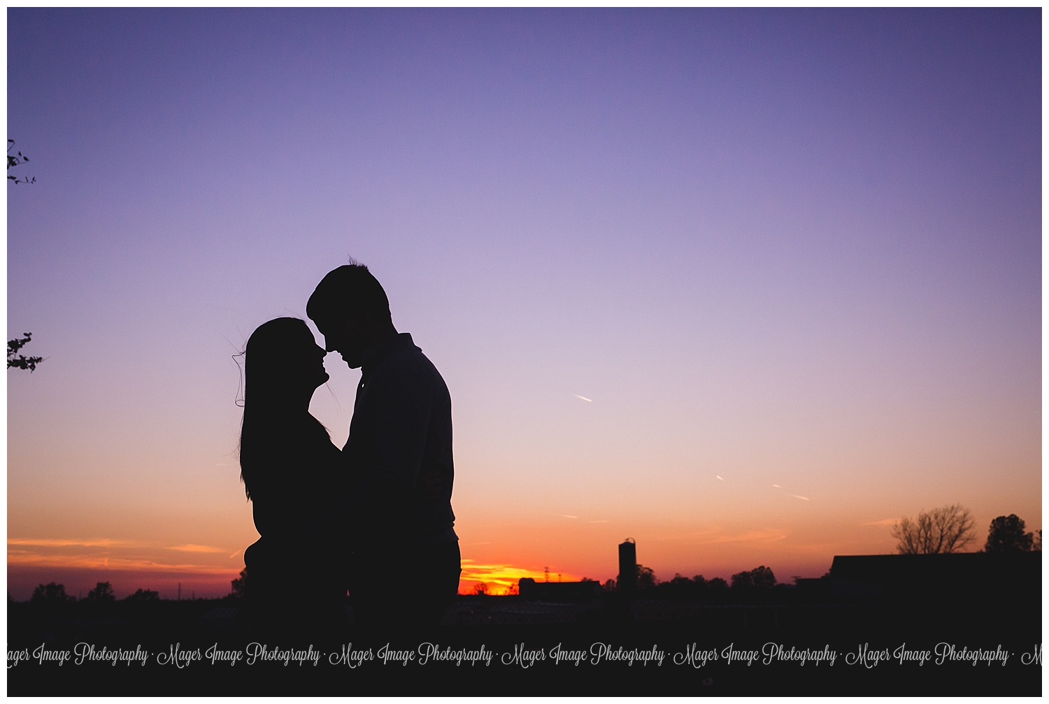 sunset purple light silhouette photo couple engagement session