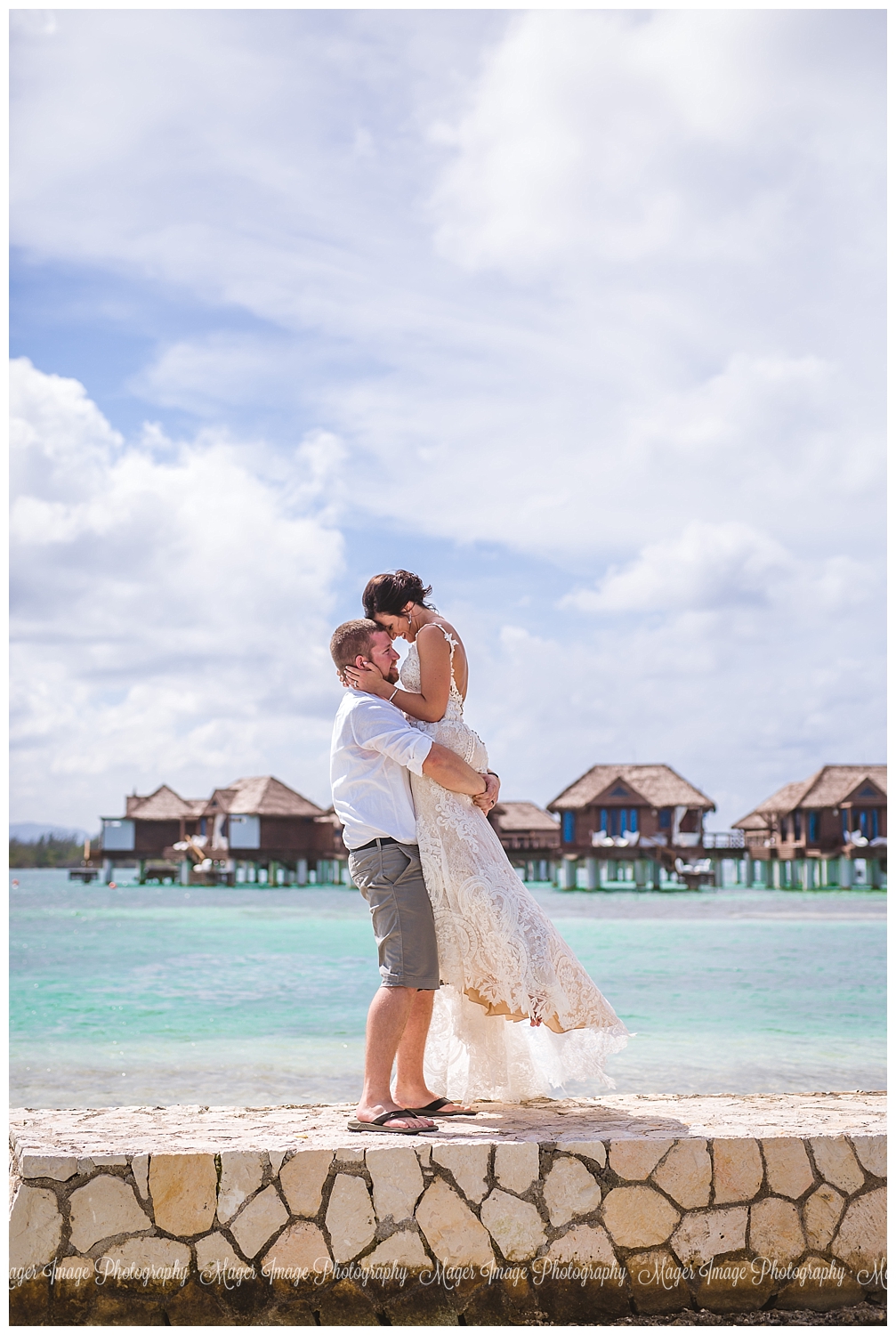 clear water sandals huts wedding
