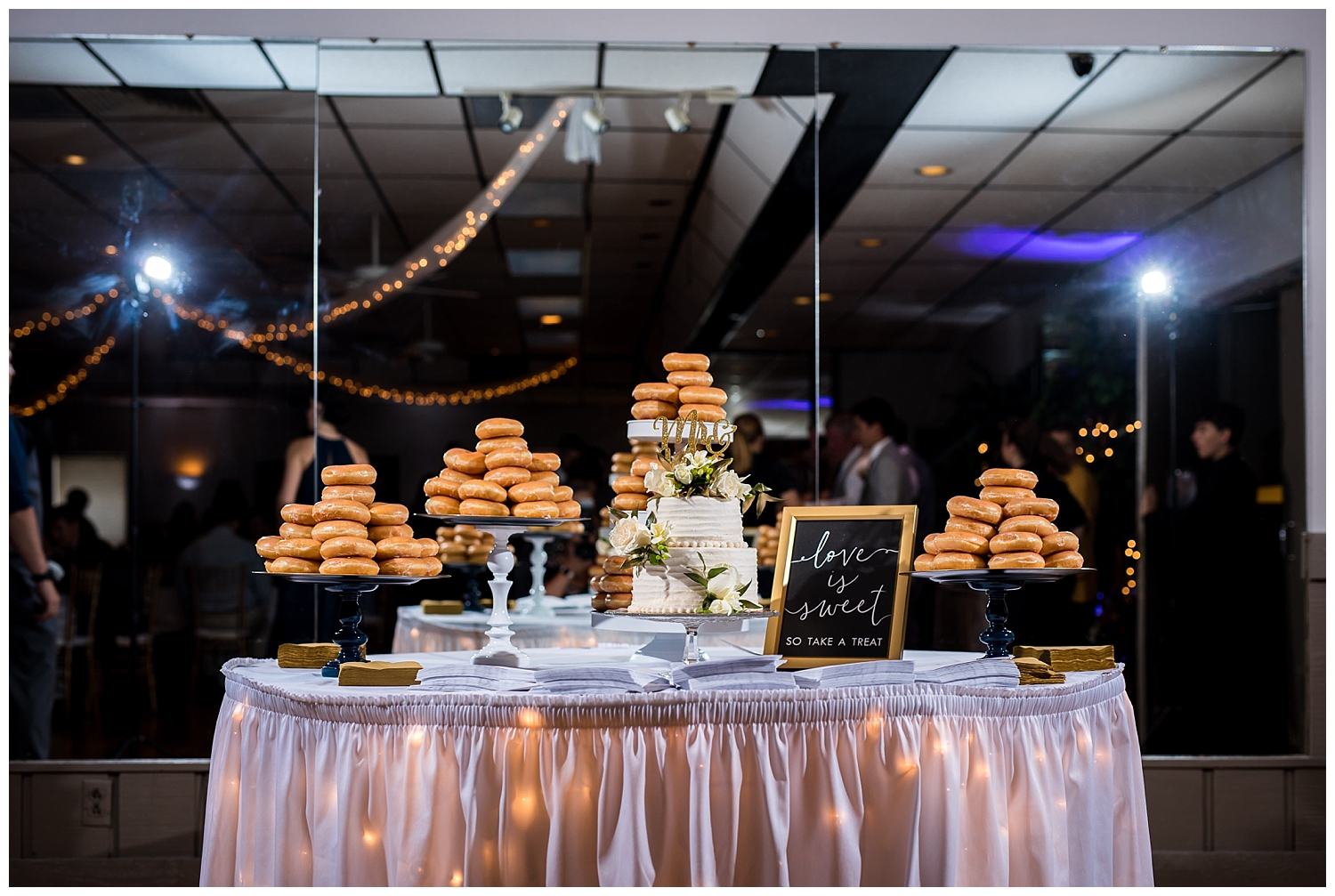 cake table with donuts krispy kreme