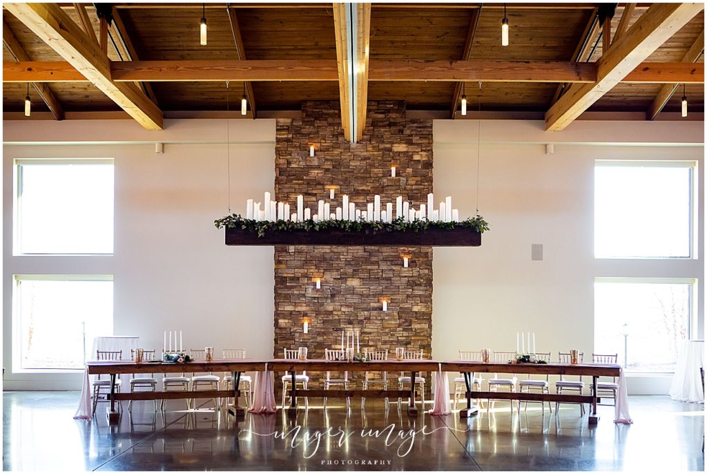 pear tree estates winter wedding reception venue head table beam