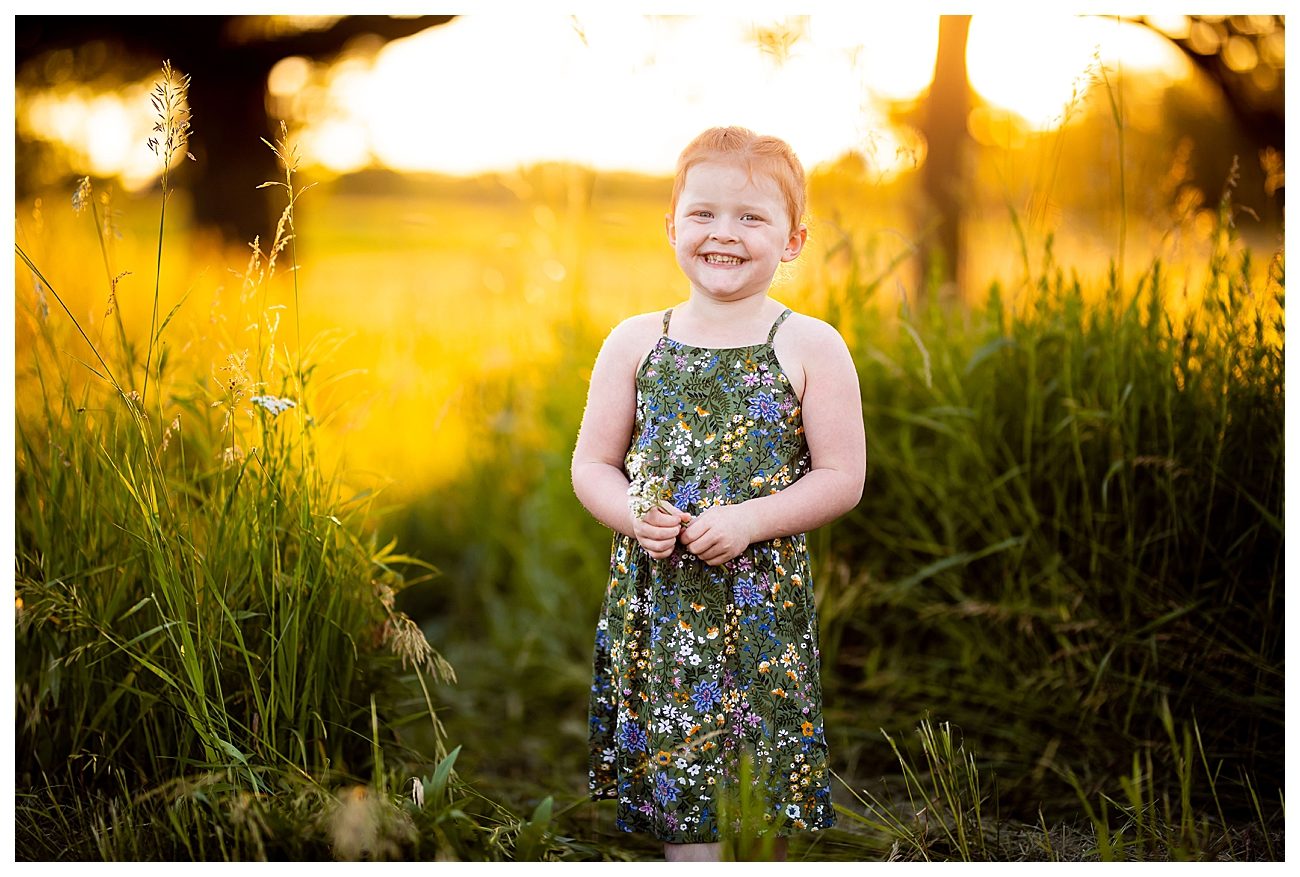 smiling toddler sunset portrait