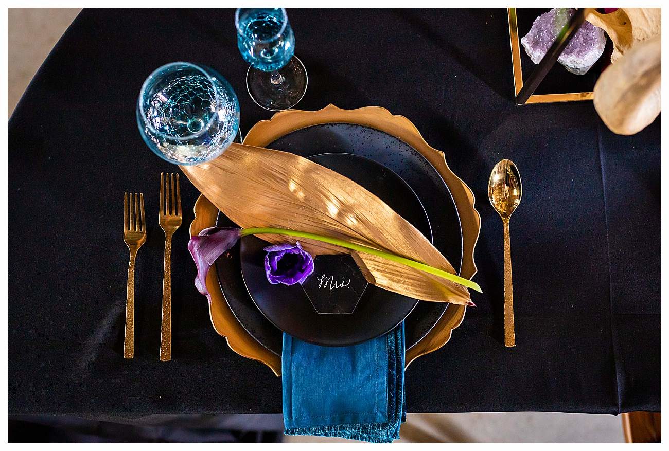 teal and gold table setting