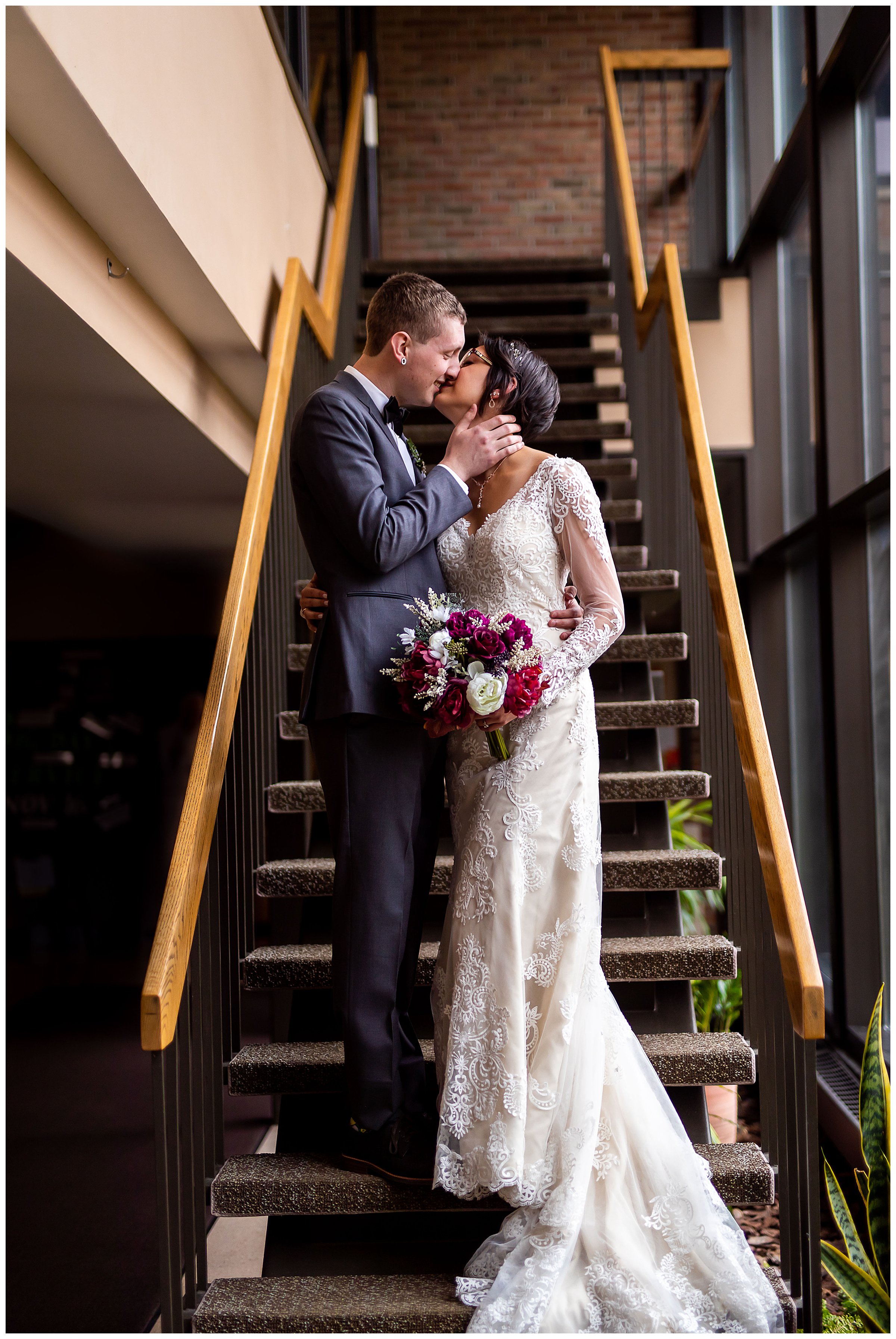 romantic wedding staircase kiss