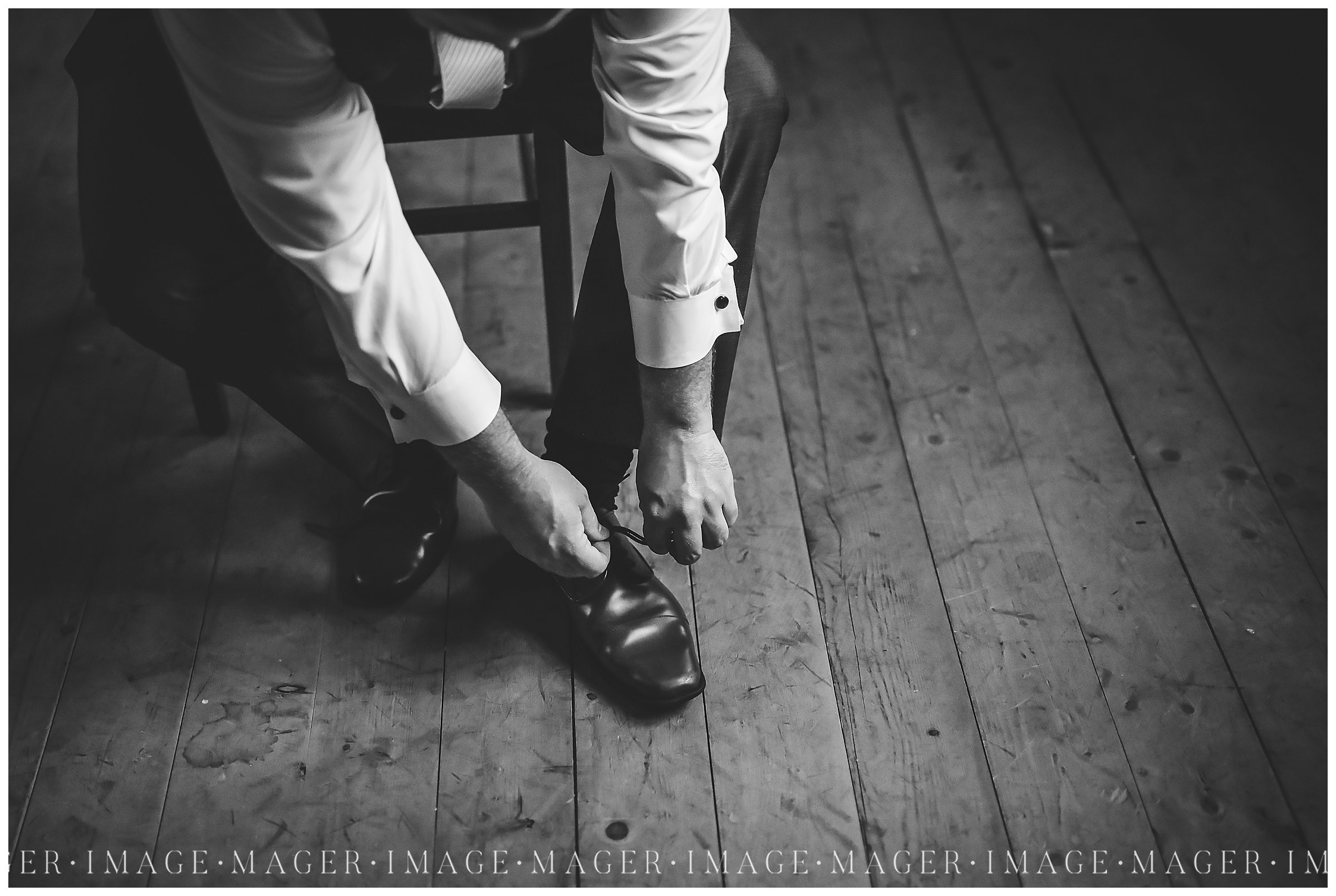 black and white bridal portrait groom getting ready 
