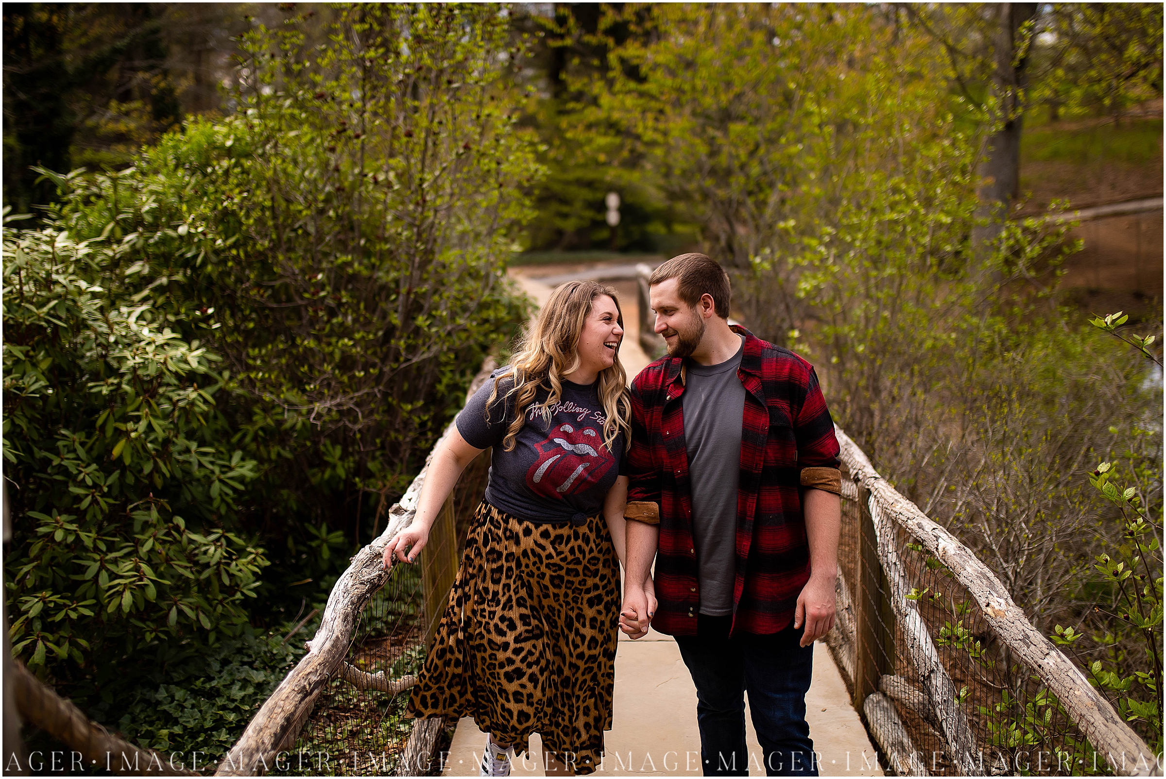 wooden bridge Biltmore Estate, happy couple walking, engagement session