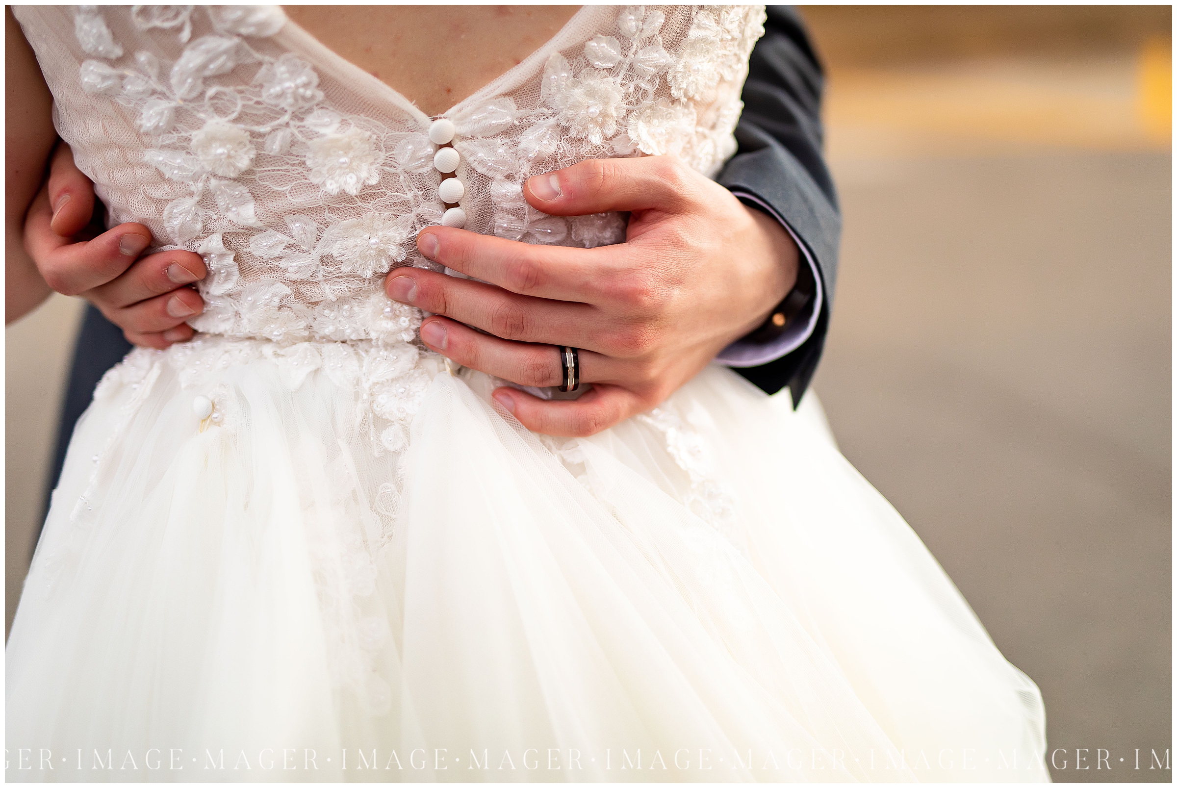 lace and traditional button wedding gown