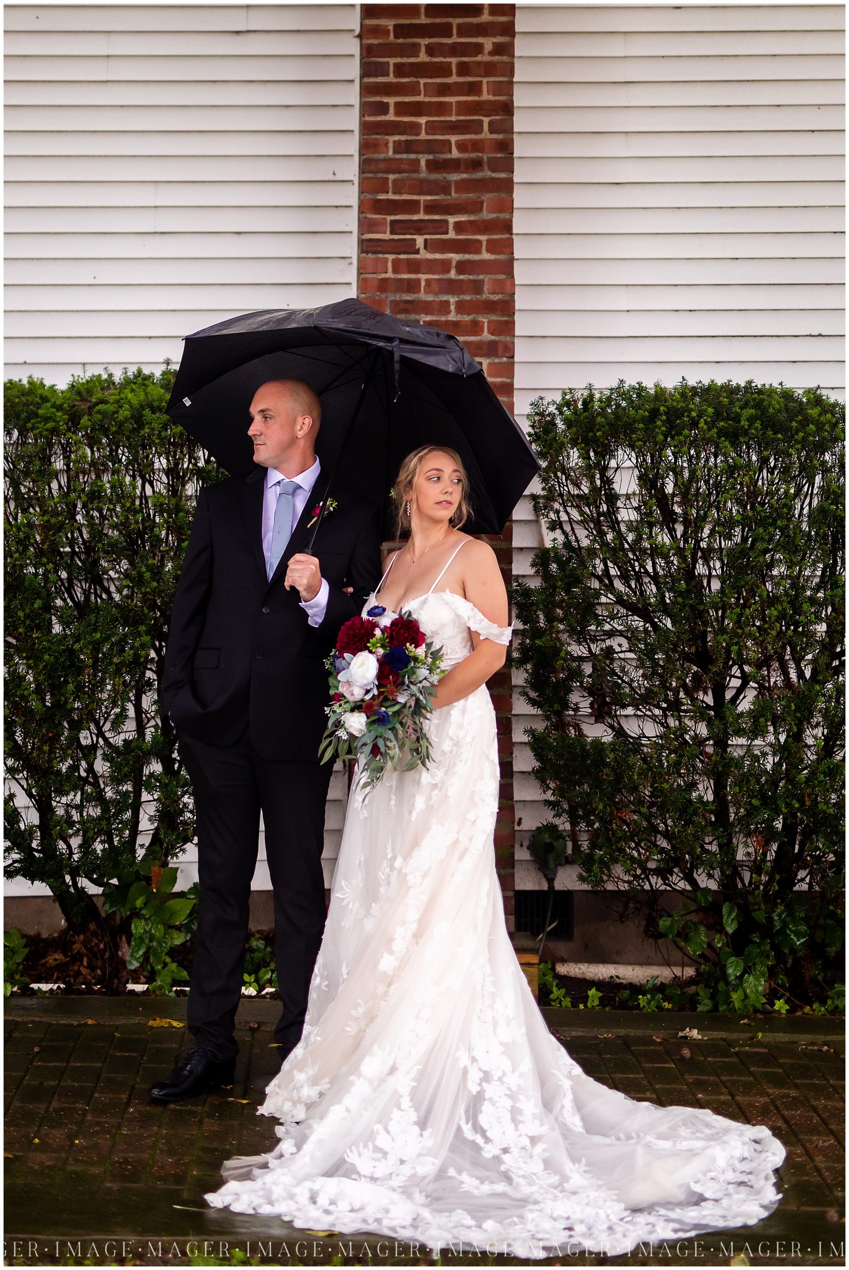 memorial-day-wedding-barn-dress-bride-rainy-day-umbrella