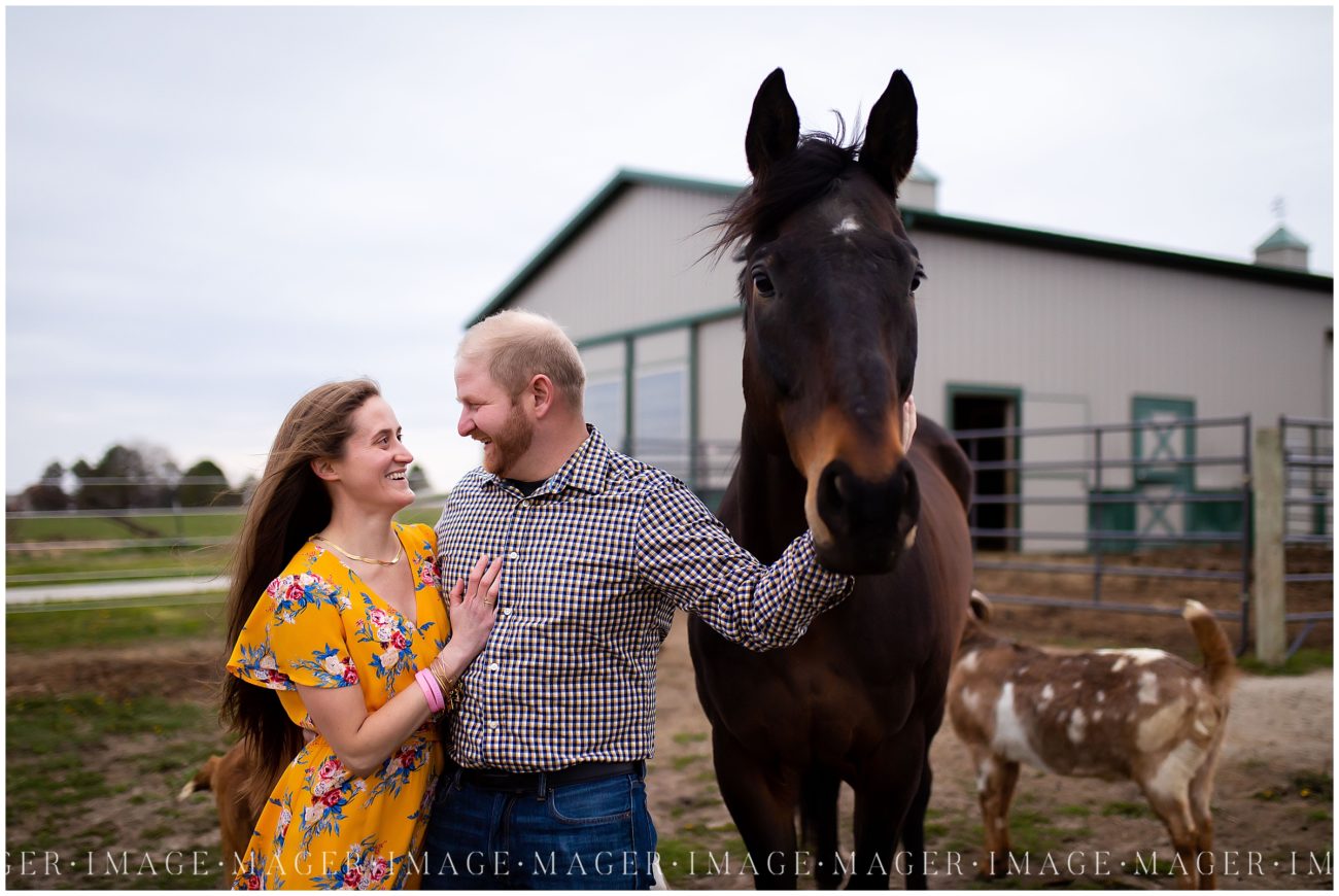 A couple poses with their horse. 

A couple poses sitting on their front step. 

Rantoul, IL.

Photos by Mager Image Photography.