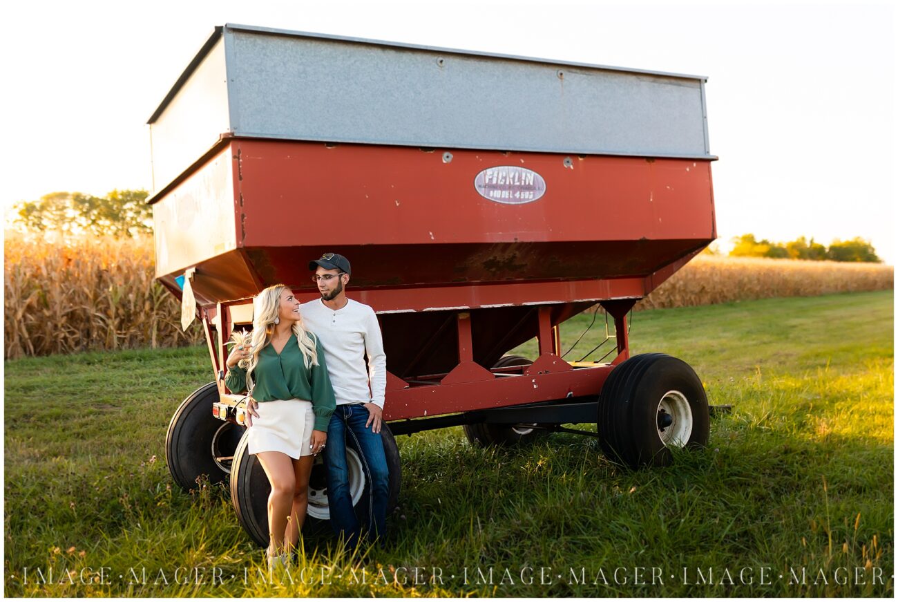 farm grain wagon engagement photos background
