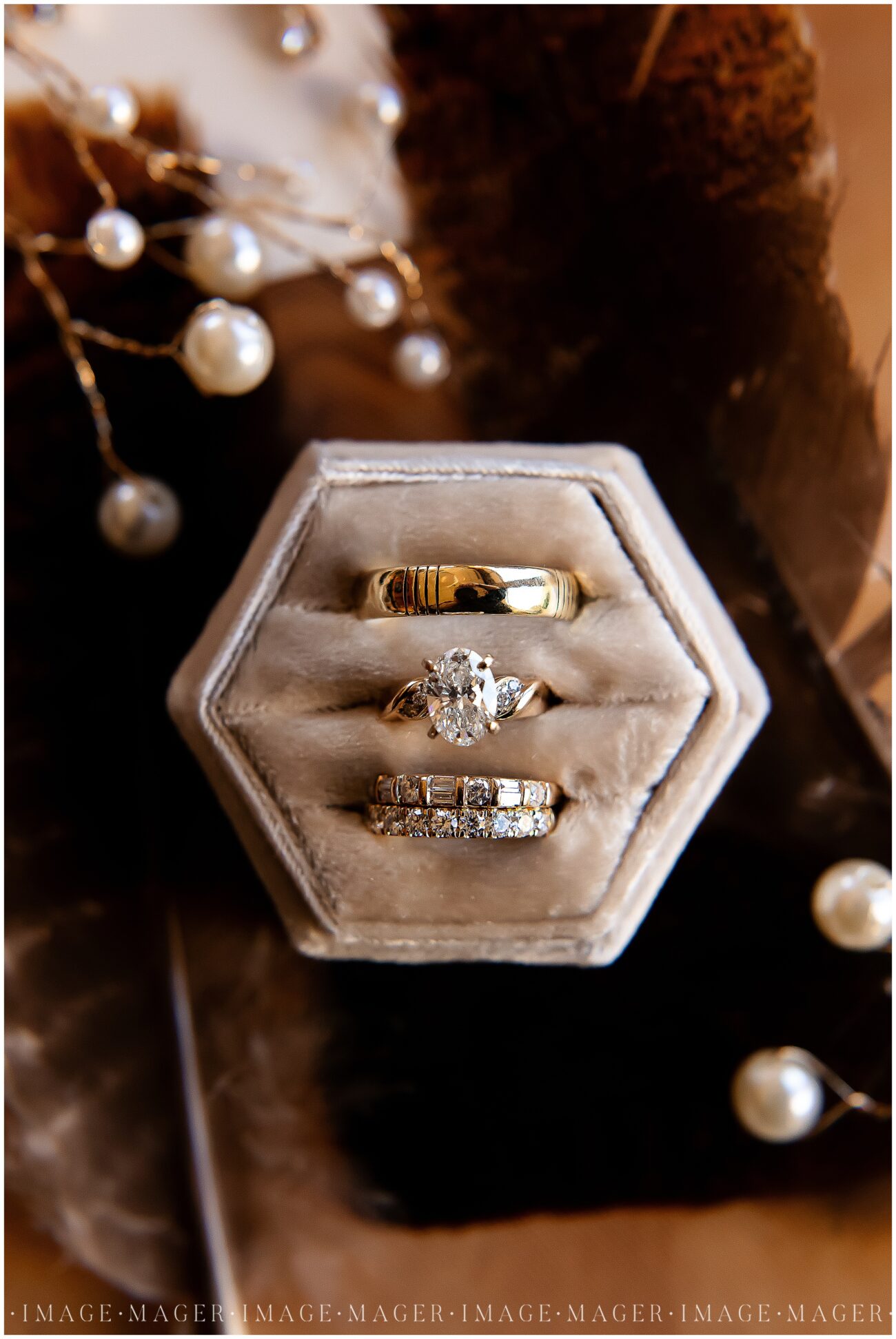 A small town wedding detail photo of the couple's rings in a velvet ring box.

L'erable, IL. Photo taken by Mager Image Photography.