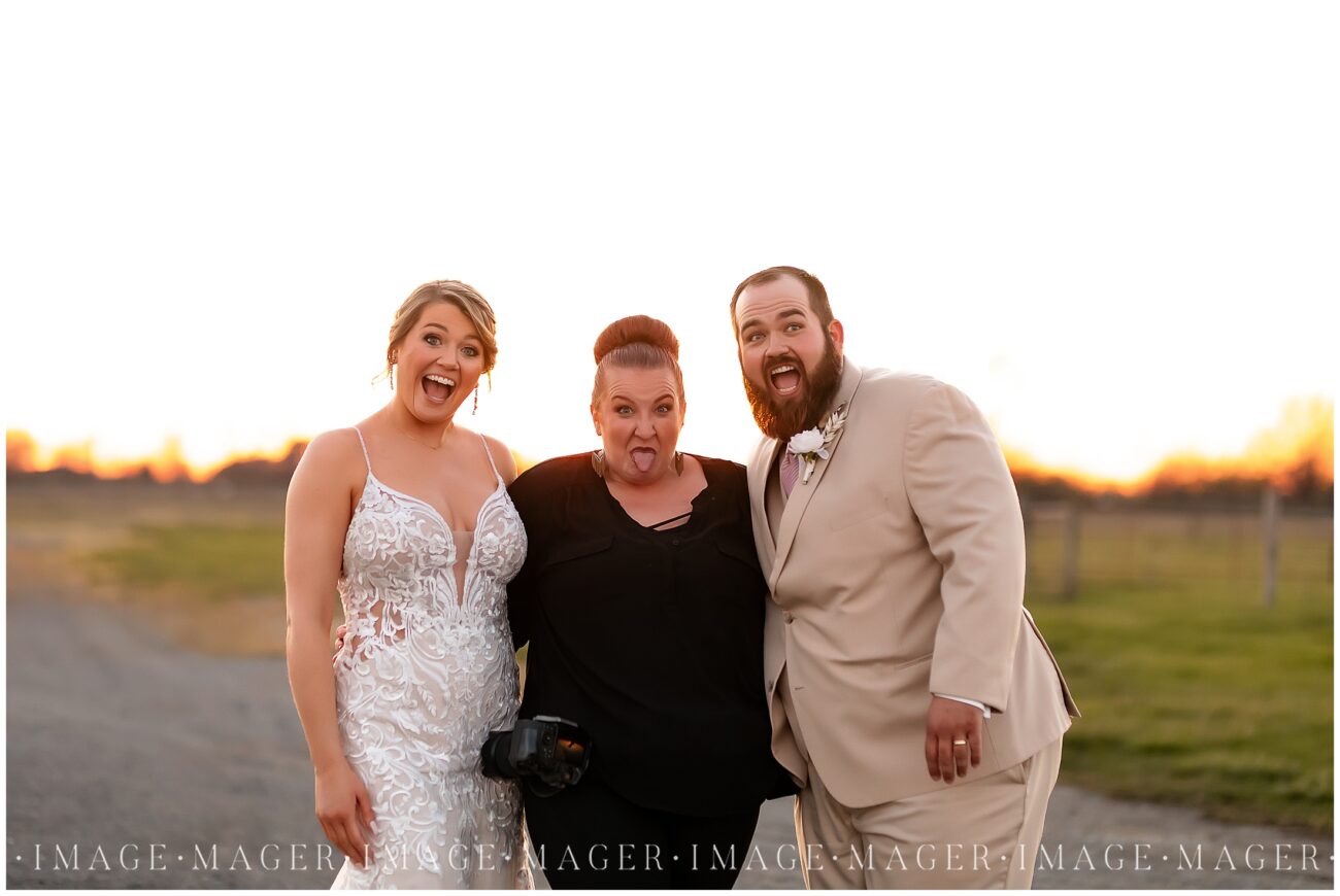 A small town wedding for Casey and Adam. The bride and groom pose for a fun picture with their photographer at sunset at the Kankakee County Fairgrounds.

Kankakee County Fairgrounds, Kankakee, IL.

Photo taken by Mager Image Photography.