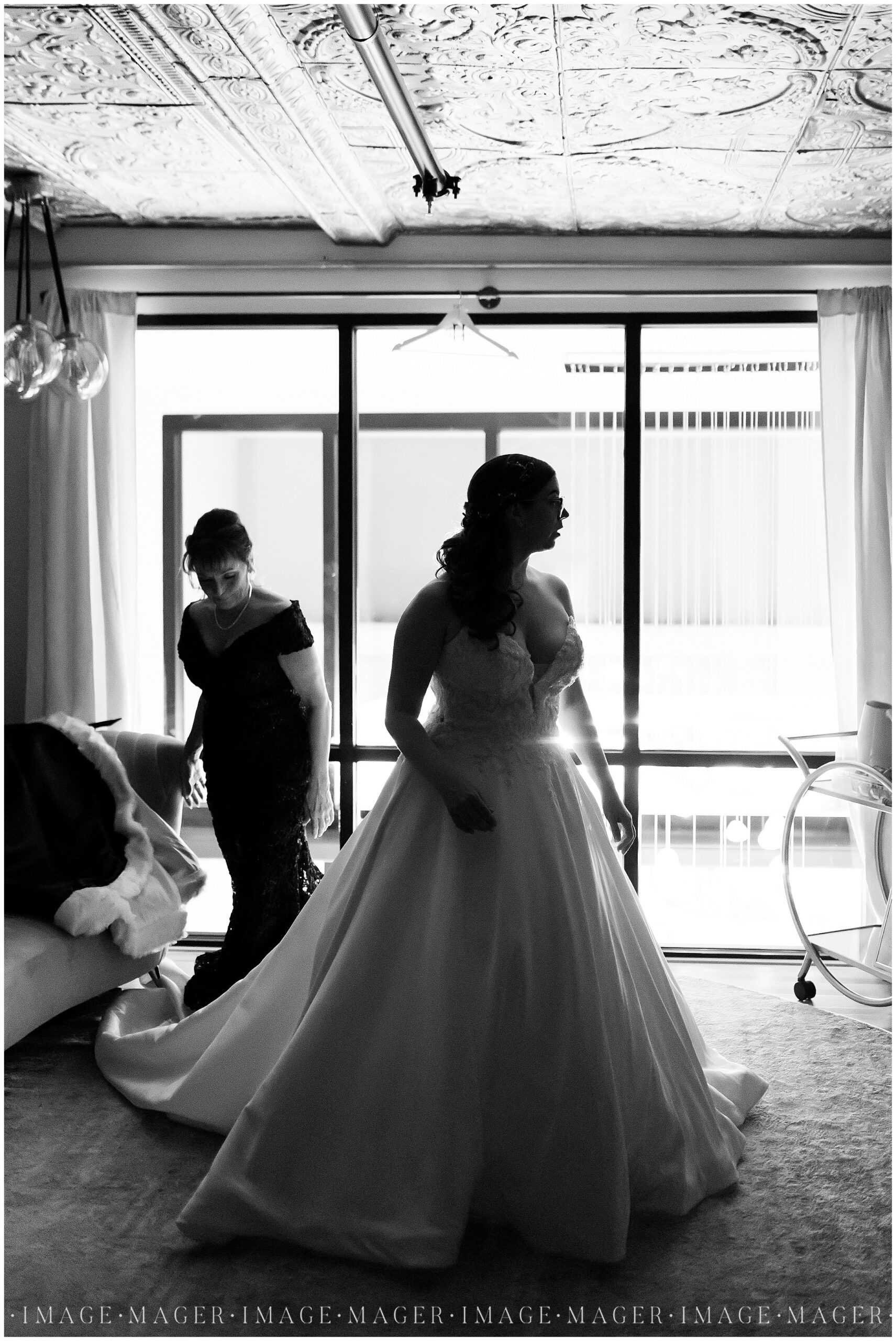 Black and white image of a bride in her dress. 

The Venue CU, Champaign, IL

Photos by Mager Image Photography