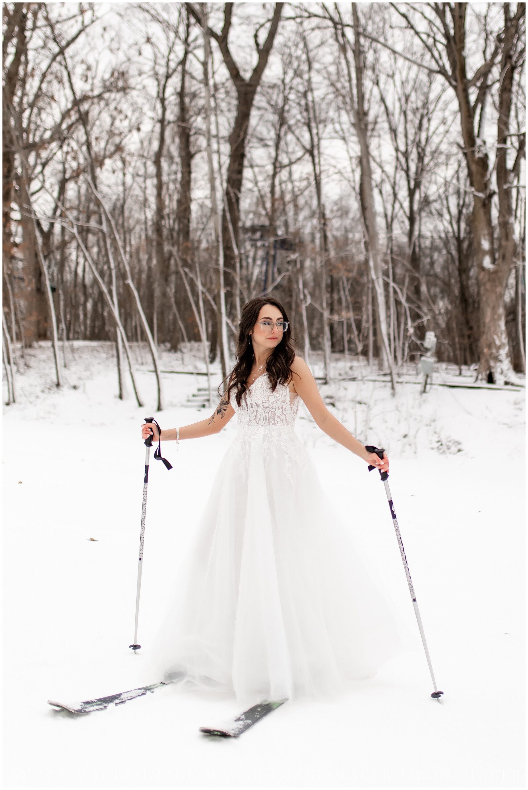 alpine valley ski resort snowboarder wedding portraits in snow slopes