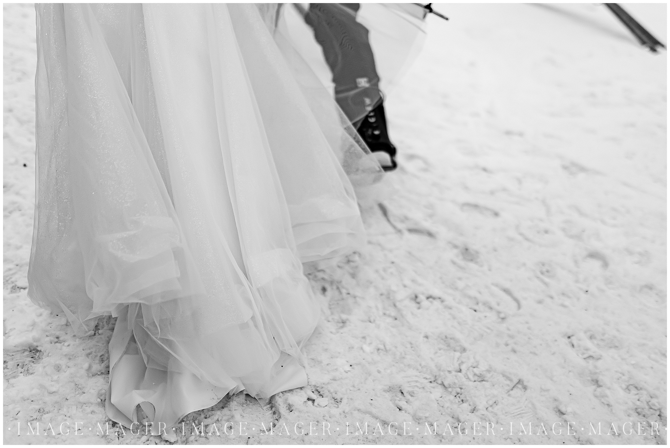 alpine valley ski resort snowboarder wedding portraits in snow slopes