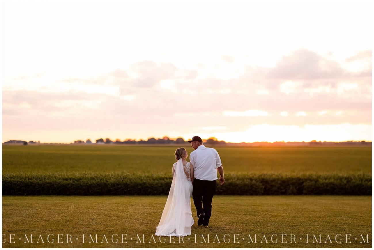 Bride and groom at sunset during Hudson Farm wedding in Urbana, IL