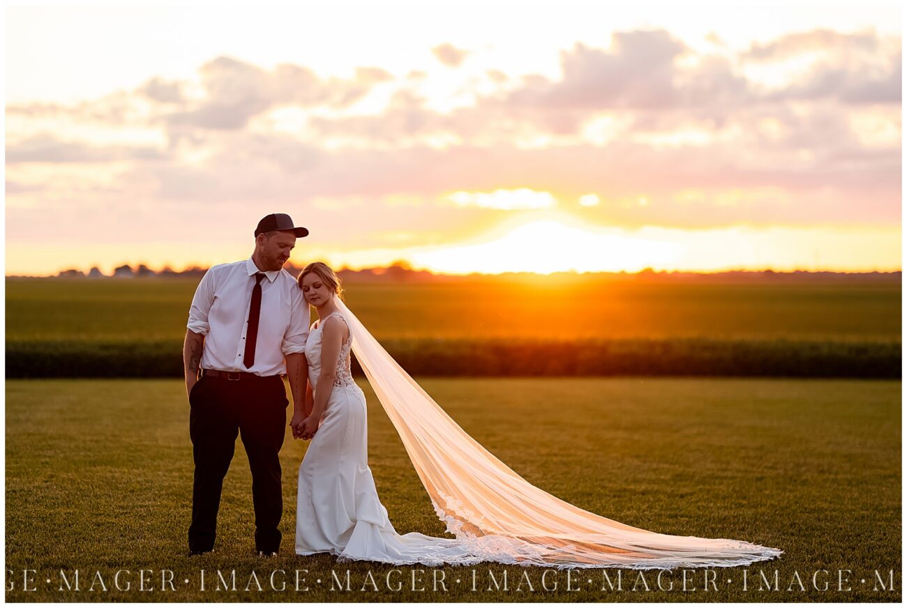 Bride and groom at sunset during Hudson Farm wedding in Urbana, IL